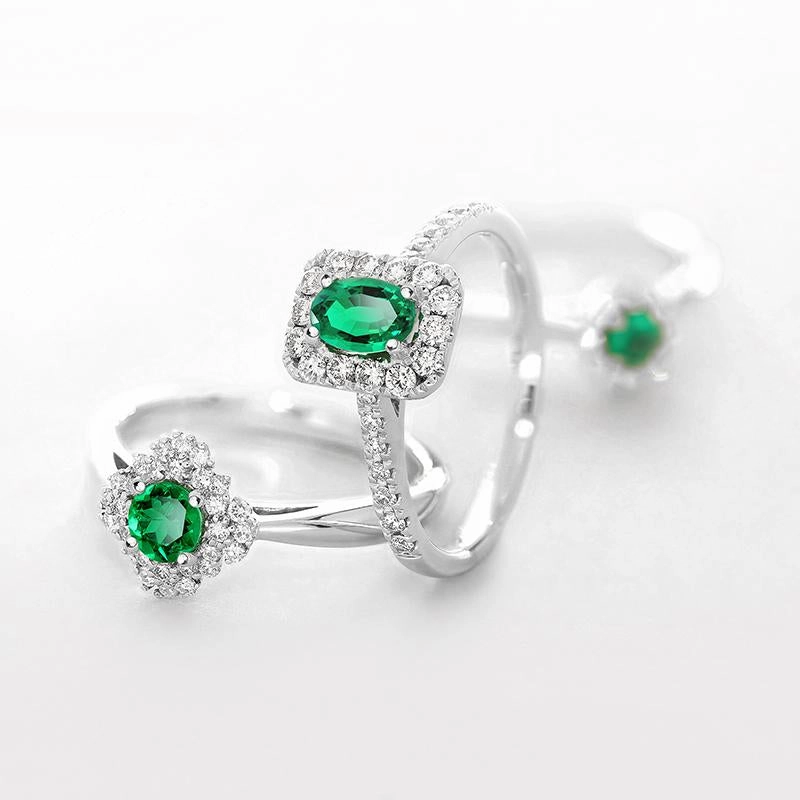 18ct White Gold 0.44ct Emerald 0.37ct Diamond Oval Cut Ring
