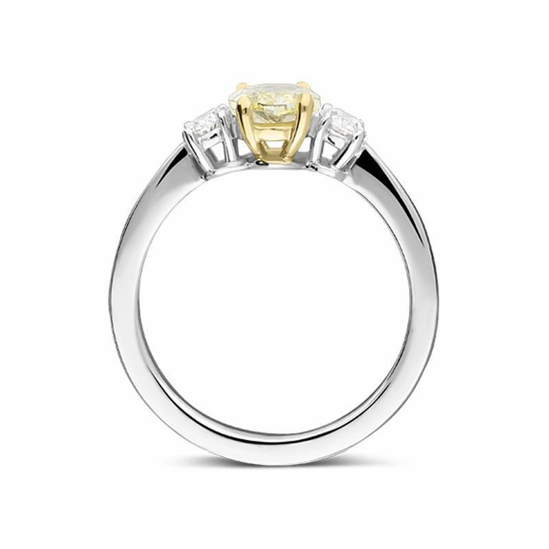 18ct White Gold 1.00ct Yellow Diamond and 0.41ct Diamond Oval Three Stone Ring