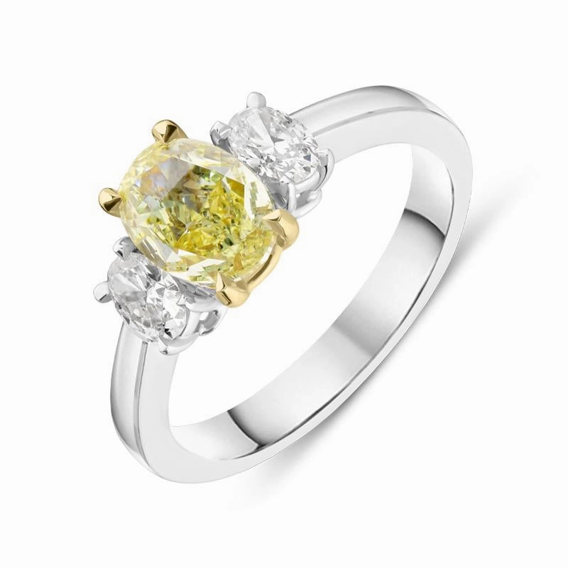 18ct White Gold 1.00ct Yellow Diamond and 0.41ct Diamond Oval Three Stone Ring