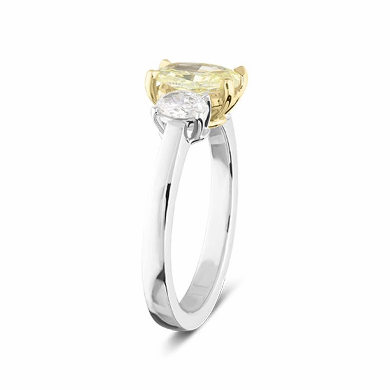 18ct White Gold 1.00ct Yellow Diamond and 0.41ct Diamond Oval Three Stone Ring