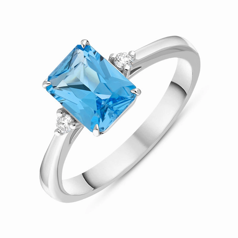 18ct White Gold Blue Topaz Diamond Emerald Cut Three Stone Ring