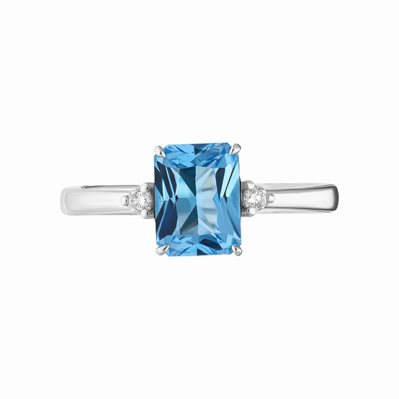 18ct White Gold Blue Topaz Diamond Emerald Cut Three Stone Ring
