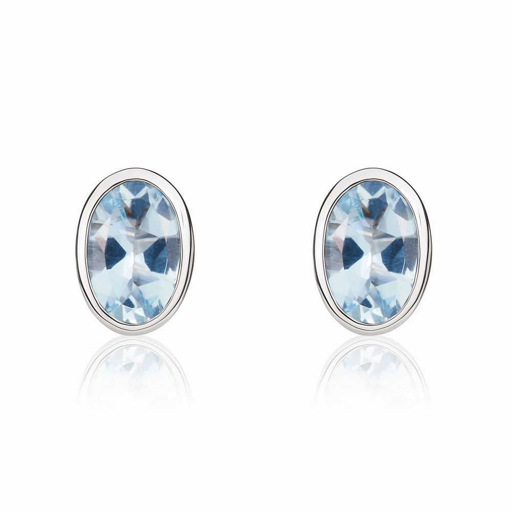 9ct White Gold Aquamarine 6x4mm Oval Rub Over Set Stud Earrings