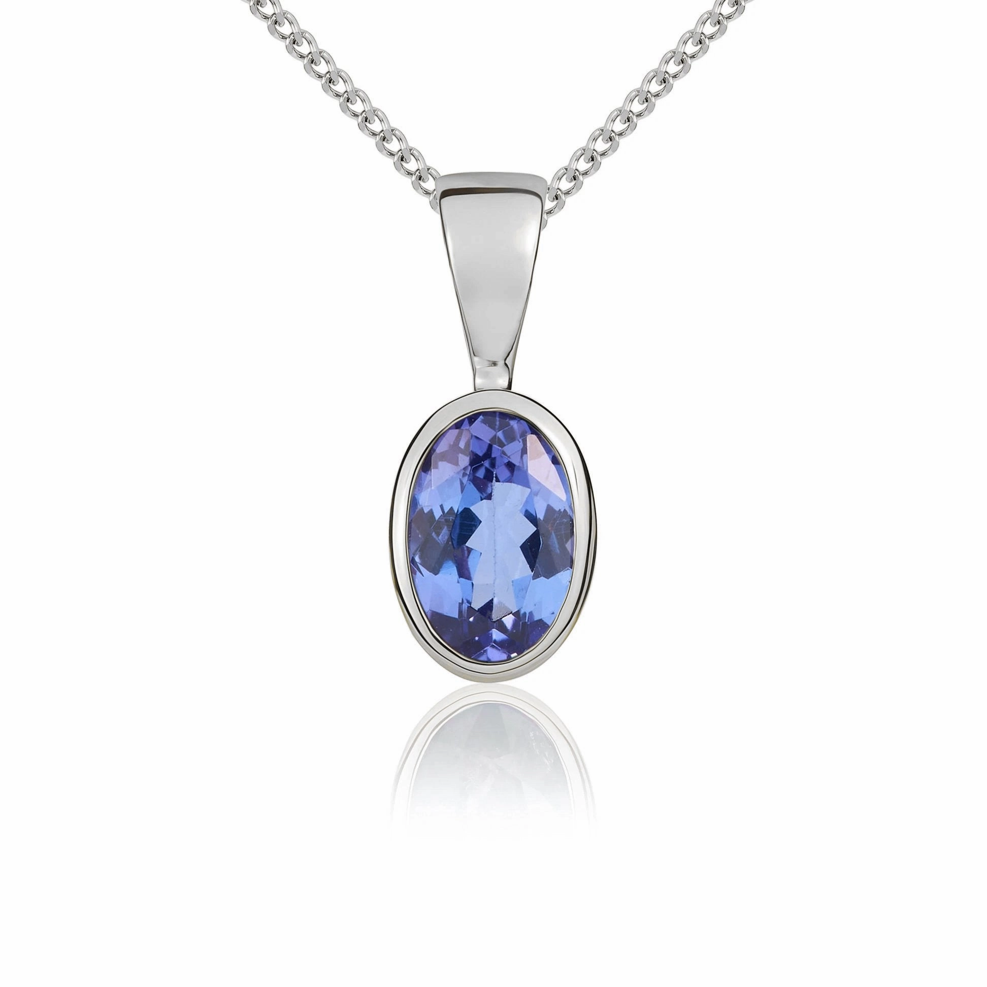 9ct White Gold Tanzanite 6x4mm Oval Rub Over Set Pendant and Stud Earrings Set