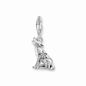 Silver wolf charm with moon and star