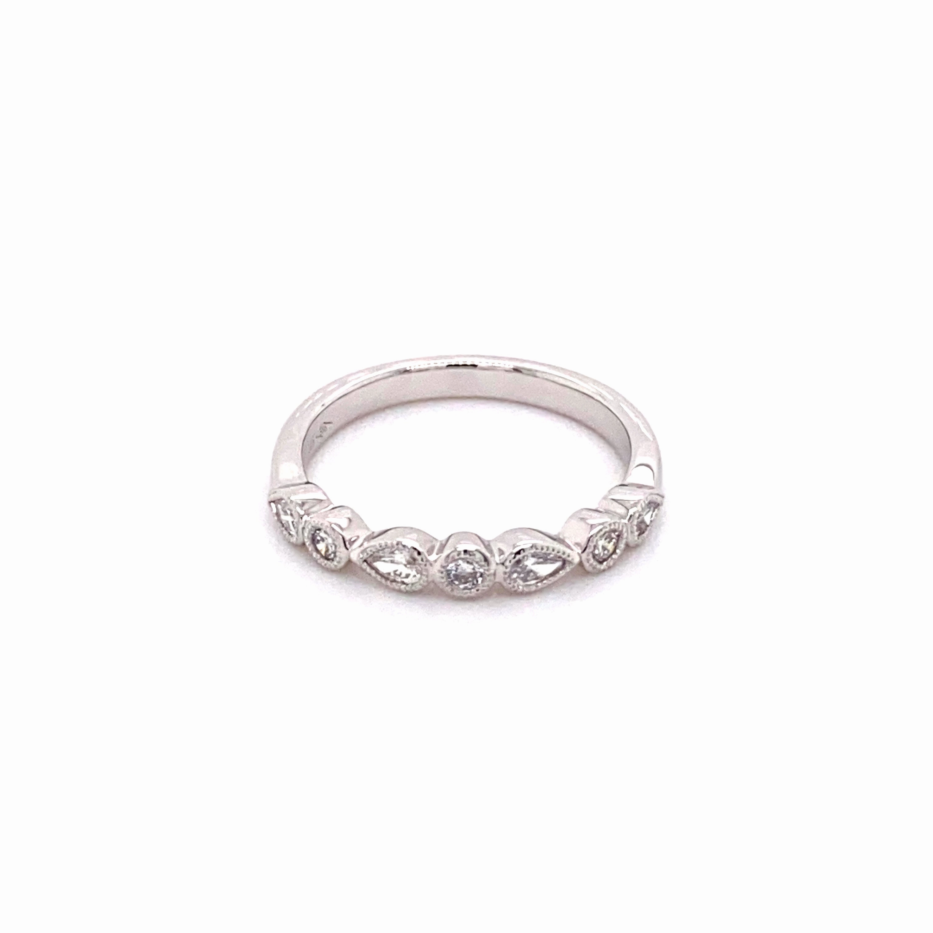 White Gold Teardrop and Round Diamond Band