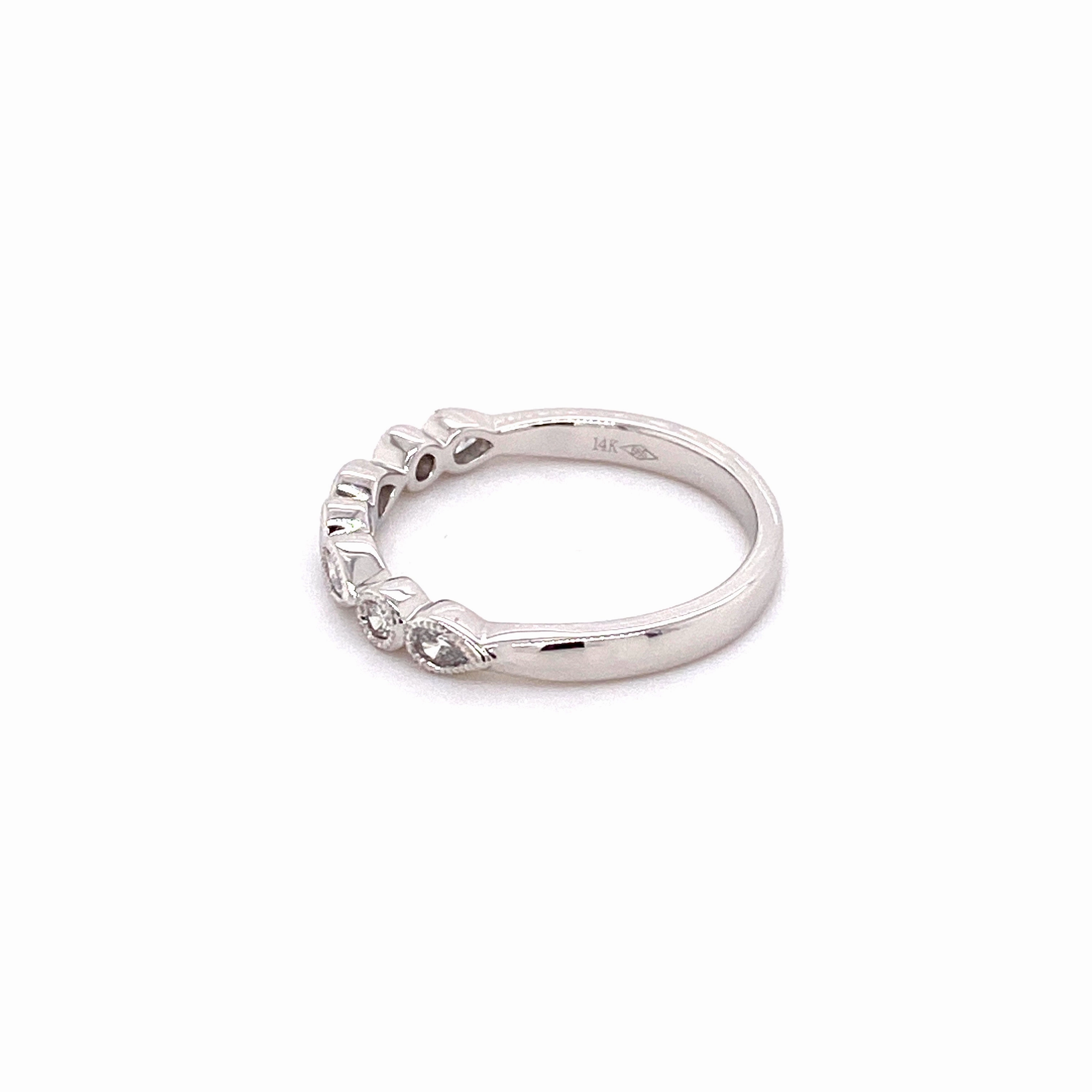 White Gold Teardrop and Round Diamond Band