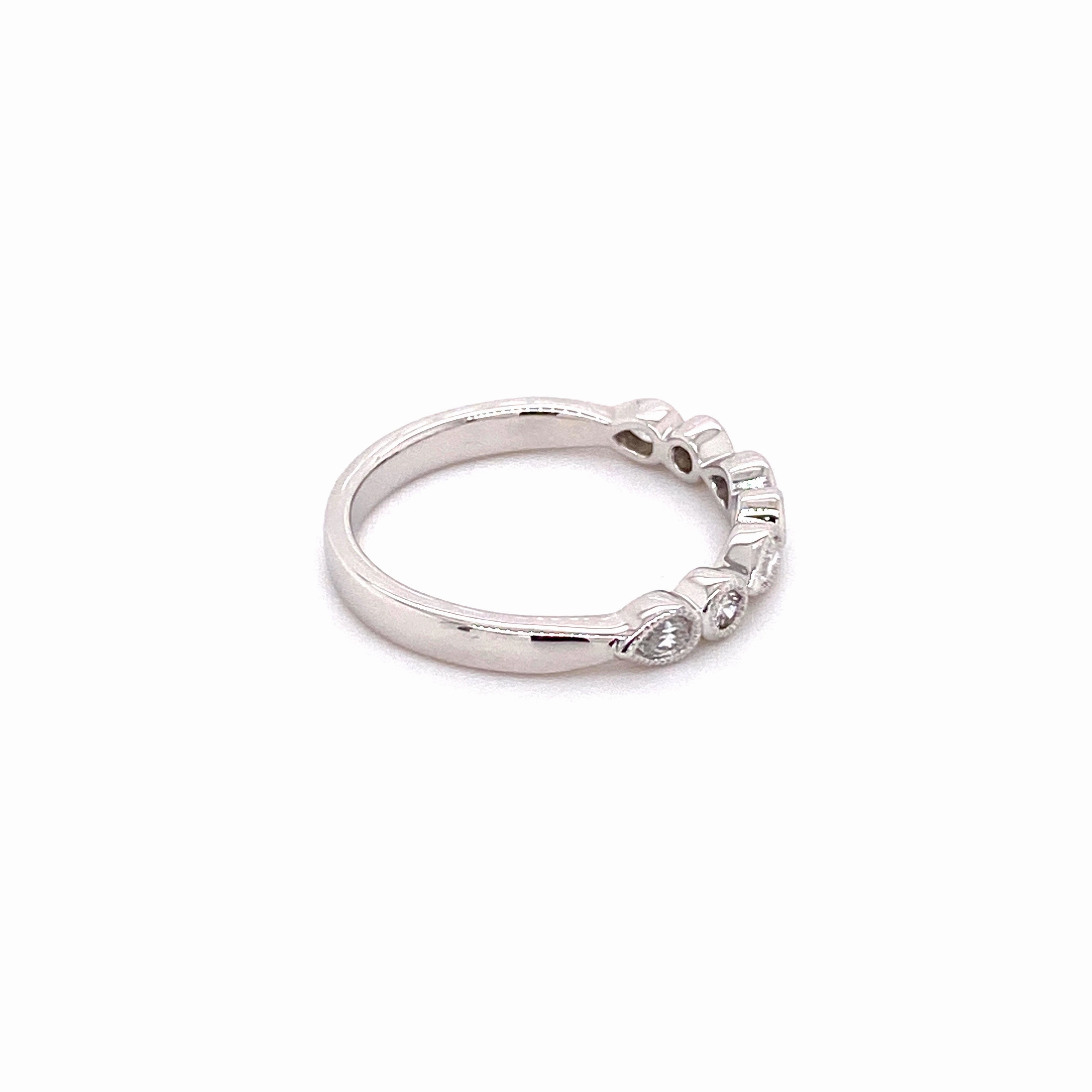 White Gold Teardrop and Round Diamond Band